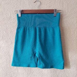 Women's bright blue-green stretchy athletic bike shorts Sz medium